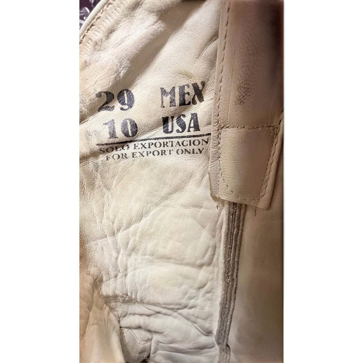 Interior size label of UNO Boots & Collectables handmade western boots showing 29 MEX and 10 USA sizing.