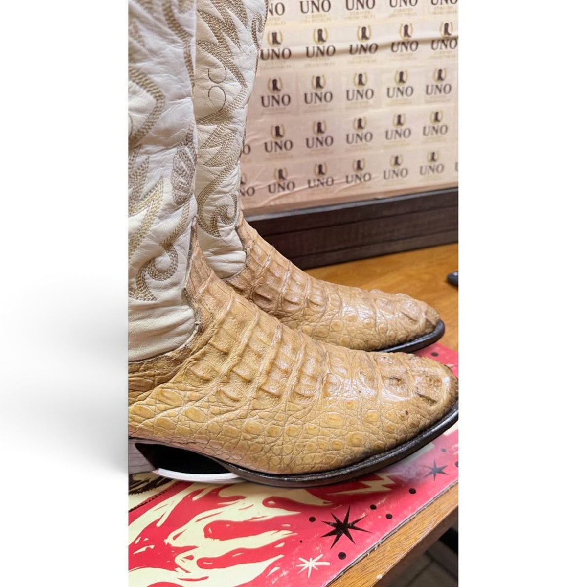 UNO Boots & Collectables honey amber caiman hornback western boots with cream leather shafts and gold embroidery.