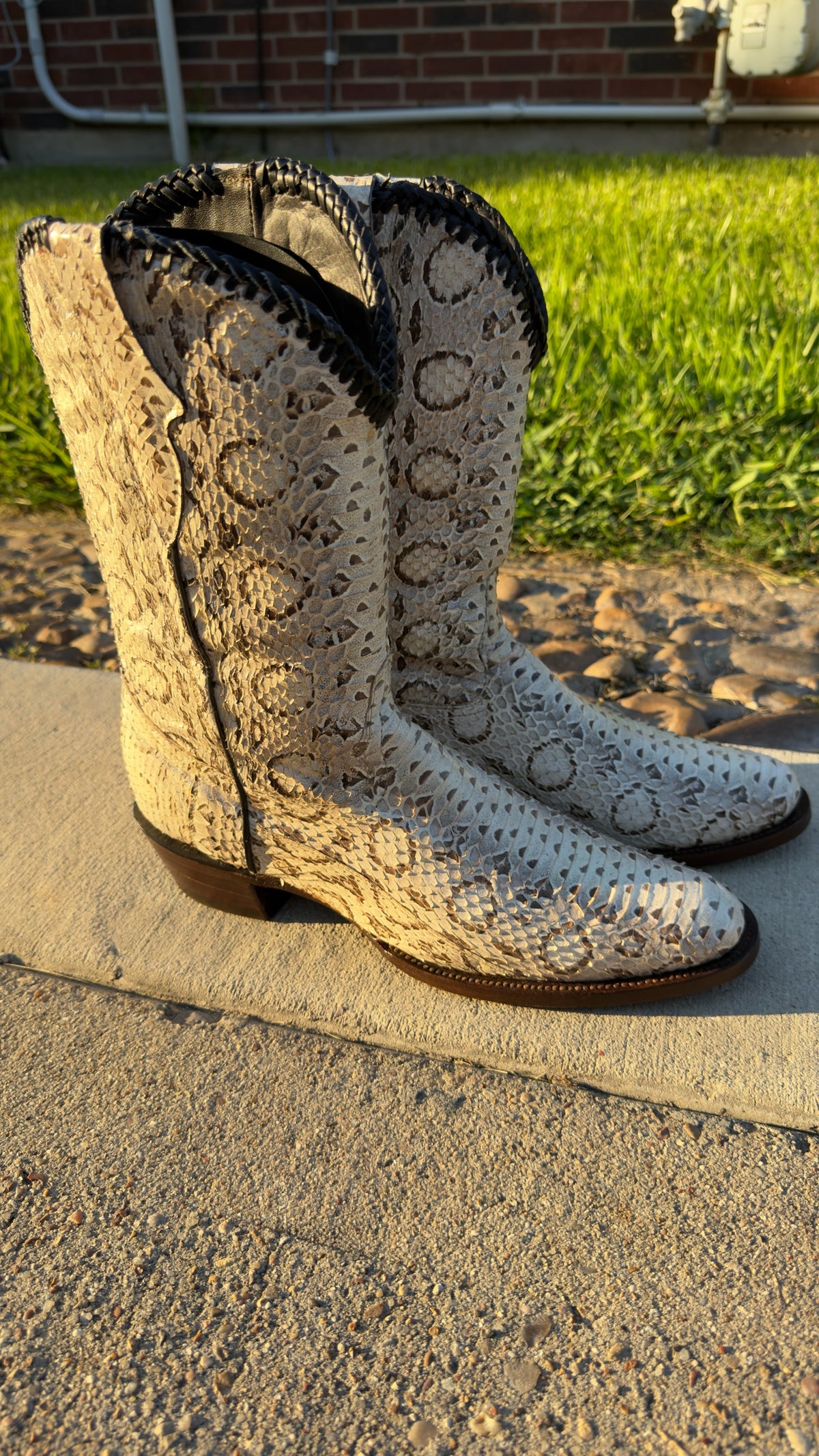 UNO Boots & Collectables genuine python skin western cowboy boots in cream and earth tones with dark braided trim.