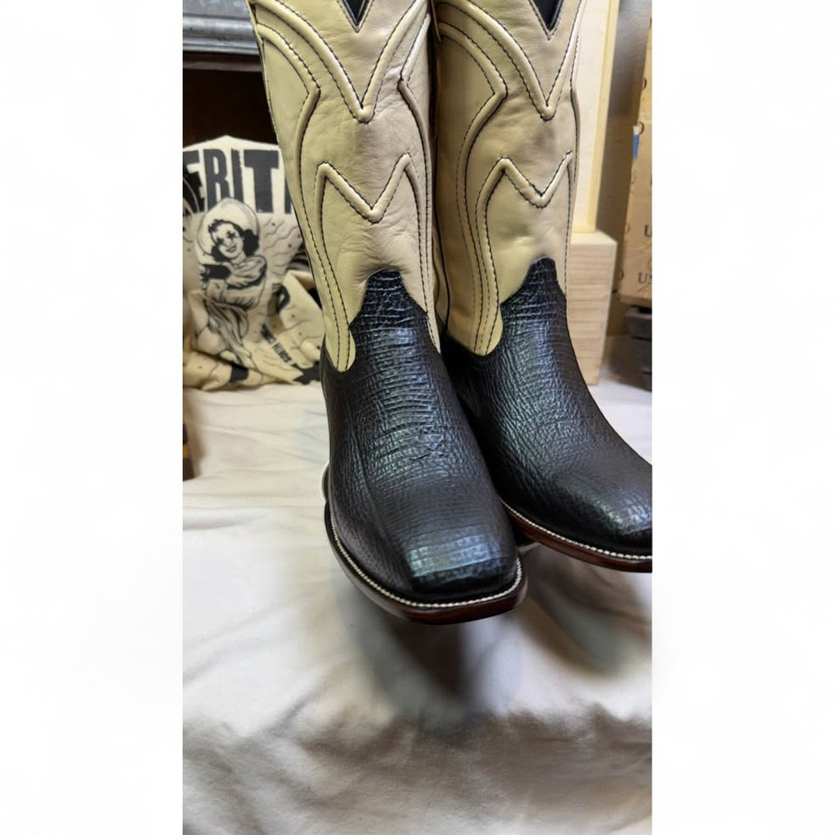 UNO Boots & Collectables two-tone cowboy boots with black textured leather vamps and cream leather shafts, square toe.
