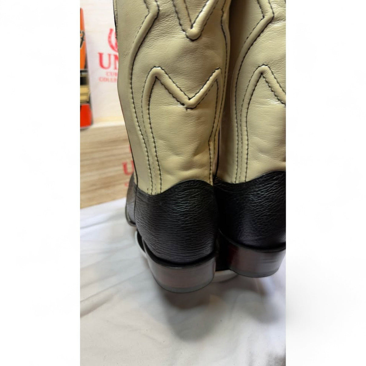 UNO Boots & Collectables two-tone cowboy boots with black textured leather vamps and cream leather shafts
