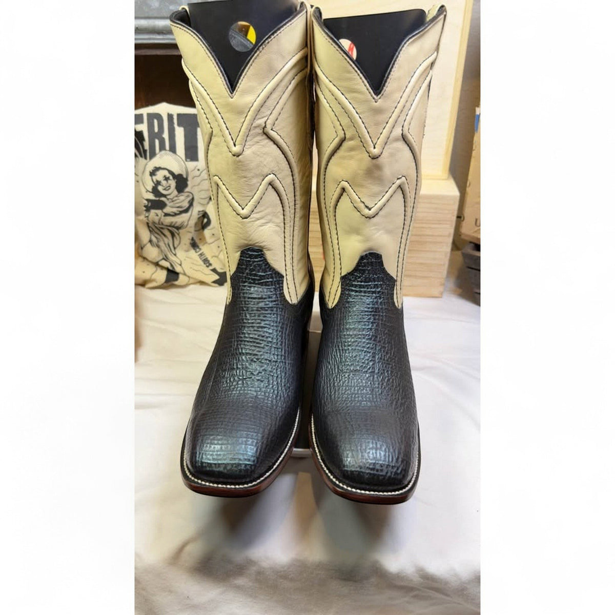 UNO Boots & Collectables two-tone square toe cowboy boots with black textured vamp and cream leather shaft.