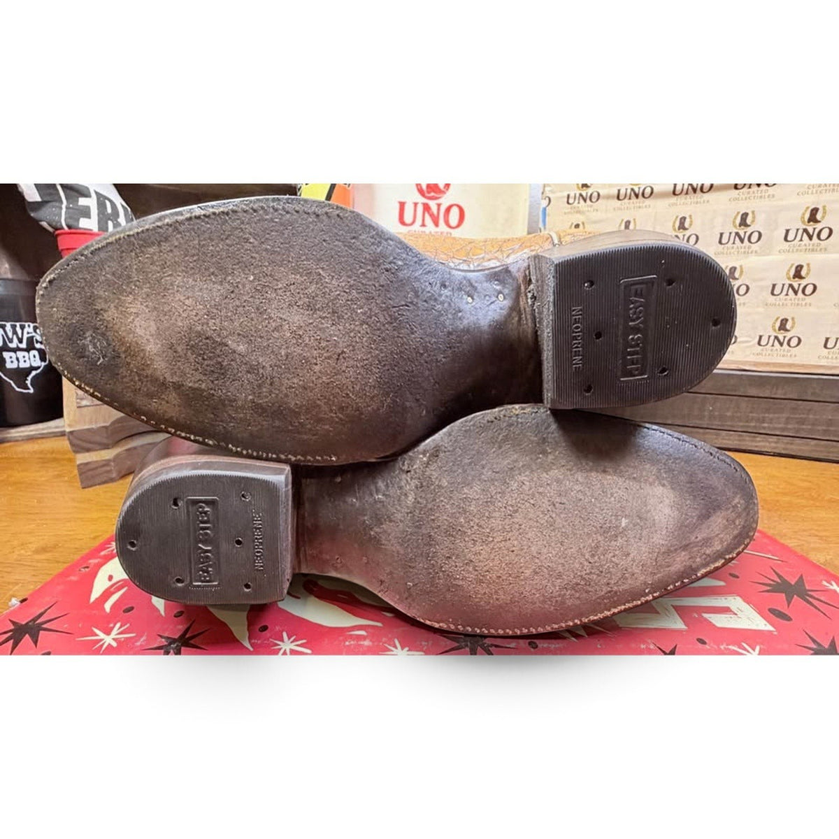 UNO Boots & Collectables pre-owned western boots showing worn black leather outsoles and Easy Step neoprene heels